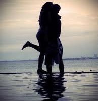 Kissing by the sea