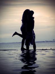 Kissing by the sea