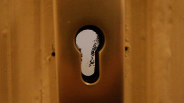 peek through a keyhole